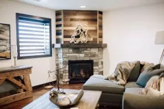 Corner_angled_fireplace_with_barn_board_above_